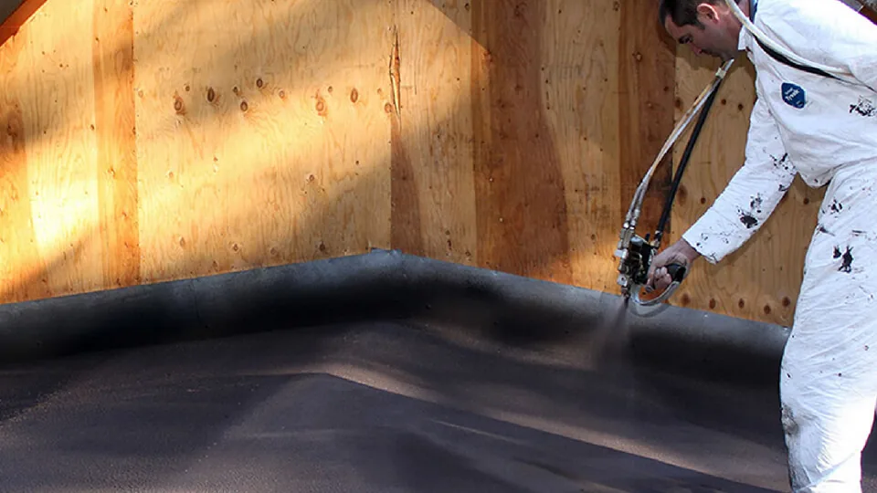 WetSuit® being spray-applied to a flat roof
